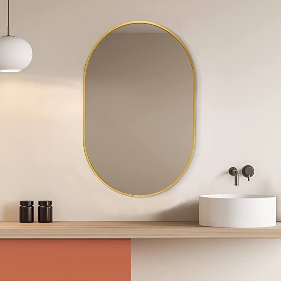 Custom oval gold bathroom mirror installation Dubai UAE | مرآة بيضاوية حسب الطلب